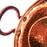 Mexico 1492: A hammered copper saucepan (or better known as cazo in Mexico), handmade in Santa Clara del Cobre, by one of the oldest, most respected coppersmith workshops of don Viduel. The copper hammering process is lengthy and arduous, but the shaping is done through a series of soft hammer blows that create the recognizable indentations on the surface. 