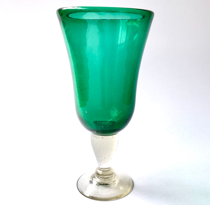 Mexico 1492: Shaped like a colored bell, with a transparent stem and foot, and hundreds of air bubbles reflecting the light, these classic wine glasses are a centerpiece and a conversation starter. Hand made with care, reflecting decades of traditional Mexican glass factories.  Available in Amethyst Purple, Turquoise, Fire Red, Cobalt Blue, Emerald Green, Lime Green and Smoke. 