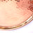 Mexico 1492: A shiny copper comal, hammered by hand. Comal (from the Nahuatl comalli) is a flat surface that, placed over fire or a stove burner, served through centuries to cook tortillas, tlacoyos, gorditas, or roast cocoa beans, and in recent centuries, coffee. 