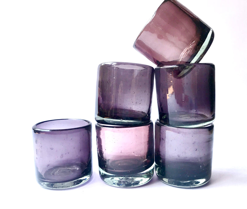 Mexico 1492: Hand blown shot glass with the trapped bubbles that pop color and start the fiesta on every occasion. Made by the master blowers in Mexico. Indigo. 