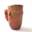 Mexico 1492: Stunning shot glasses with Zapotec profile-shaped ornaments, made from red clay and marked with random flame spots, adding character. Excellent for serving tequila or mezcal. Lead free, unglazed. Thanks to the handmade nature and the flame marks, no two pieces are the same, or even of the same height, which adds a lot of charm and informality. 